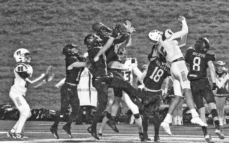 Up for grabs Pirate defenders outnumbered Eagle receivers five to three in the end zone but the last man in line, Chad Ward, #88, caught the deflected ball for a Lindale touchdown with seconds left in the first half.