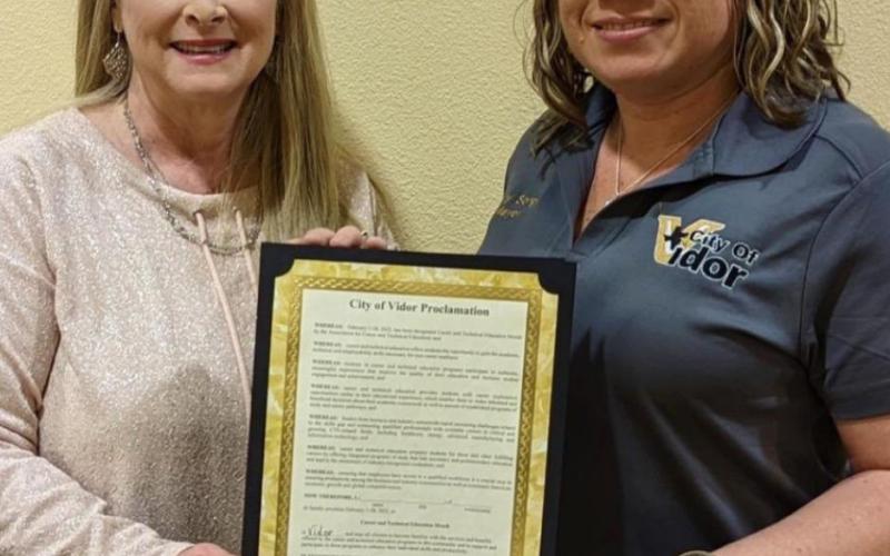 Pictured is Mayor Misty Songe presenting CTE Director Penny Singleton with a signed Proclamation Document. VISD Courtesy Photo