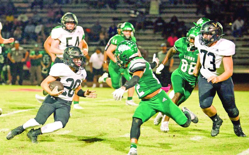 Vidor QB Daigan Venable breaks into the Lions secondary on a keeper that picked up a first down Friday.