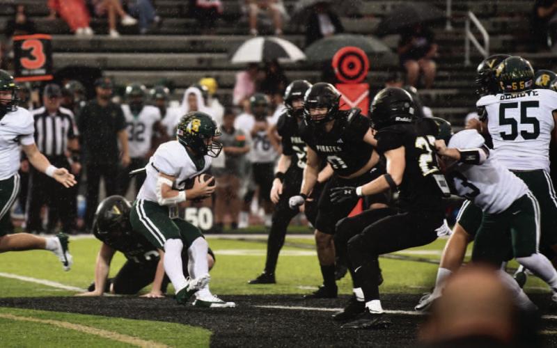 Vidor’s defensive line bars the way for an Indian ball carrier in Friday’s home opener versus the Santa Fe Indians.