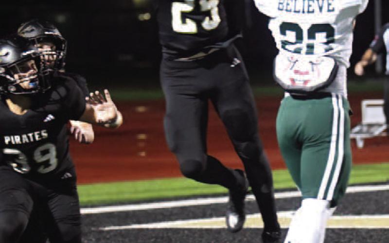 Hyrum Huish breaks ups pass play at the goal line to prevent an Indian touchdown.