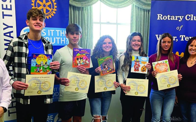 The Rotary Club of Vidor recognized the September Vidor High School Students of the Month at Their Monday luncheon. Each student received a certificate and a book that is placed on the Rotary Green Bus in their honor. Pictured: Dr. Jay Killgo, Branson Healy (junior), Jose Guerrero-Evans (sophomore), Alexus Holcomb (sophomore), Marissa Majors (senior), Kenzie Hodges (freshman), Angela Bryant (Rotary president), and Dr. Malveaux (VHS assistant principal). Courtesy photo
