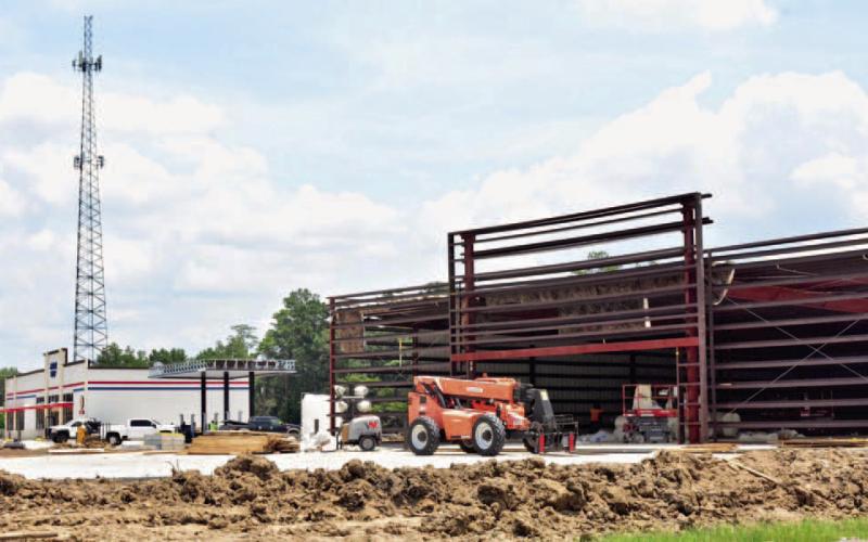 The SE corner of the Highway 12-FM 1132 intersection is a construction hotspot with two commercial properties being developed currently. A Valero gas/convenience store, background, is making progress after a delay in the availability of underground gas tanks slowed construction while its neighbor in the foreground will be a Family Dollar/Dollar Tree Combo store. Courtesy Photo