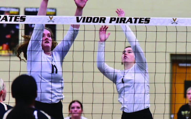 Lady Pirates Rylee Sherman, Carlie Abbott and Brilie Cornelison battle the LCM Lady Bears Friday. Photo by Randall Luker