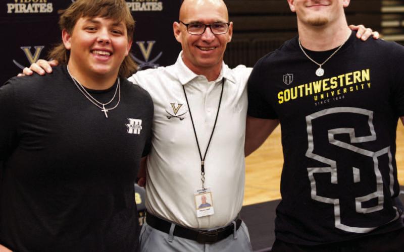 McCord and McWherter sign letters for football