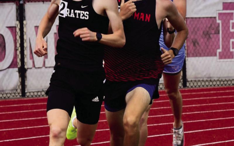 Andrew Fawcett, left, qualified for Regionals n the 800m run. Photo by Randall Luker