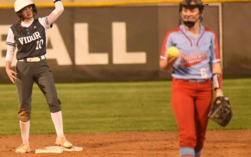 Andrea Garrett celebrates after hitting a double. Photo by Randall Luker
