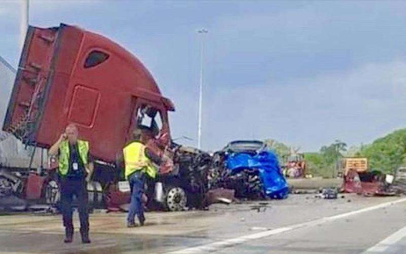 A Louisiana woman was killed when her vehicle crashed into this jacknifed 18 wheeler on IH-10 Monday. Courtesy Photo