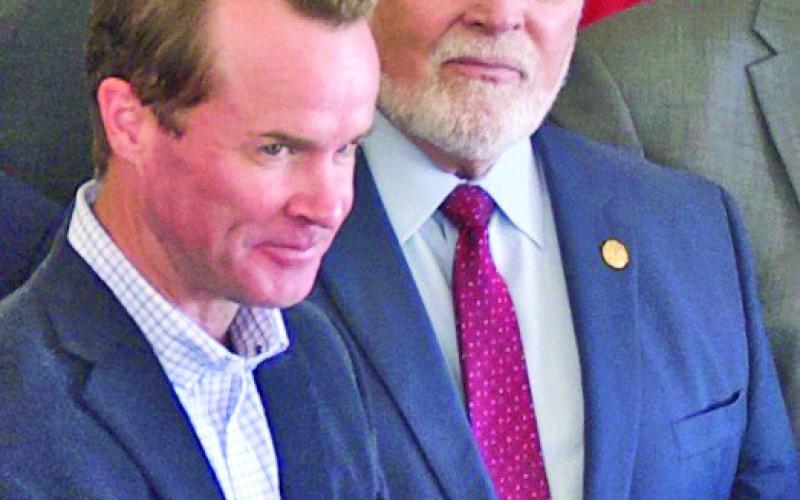 Texas Speaker of the House Dade Phelan, left, and State Senator Robert Nichols, right, were lauded Monday in Orange for their efforts to to secure $66 million in historic state funding for port infrastructure improvements for the four ports in the Golden Triangle.