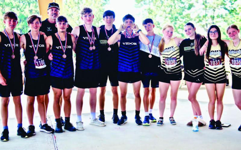 VHS Cross Country Team (Left to Right) Braedyn Leger, Nathan Fawcett, Coach Smith, Jose Guerrero - Evans, Michael Huish, George Williamson, Zane Williamson, Coy Lightfoot, (Girls) Kynnison Cook, Averie Garris, Isabella Findley, Lexi White. (not pictured) Lily Hyde.