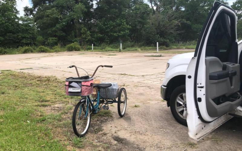 This trike apparently belonged to the deceased. Unopened purchases remained in the rear basket. Courtesy Photo