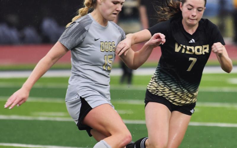 Chloe Post fends off an attempted steal.
