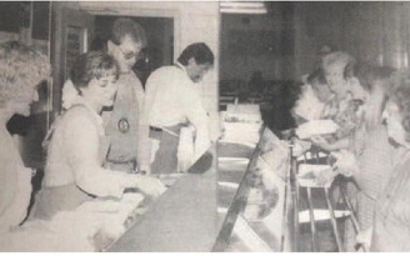 Vidor Rotarians, left to right, Karla Rogers, Suzanne Harris, Curtis Collum, Randy Wright, dish up the fish and chicken for hungry supporters at their annual fund raising dinner Monday night at the Vidor Junior High School cafeteria. There was a repeat performance Tuesday evening.