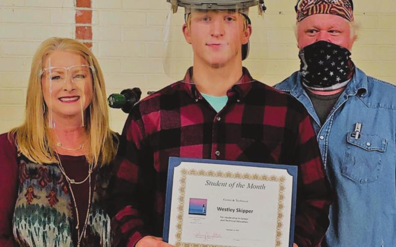 Director of CTE Penny Singleton, Westley Skipper, Welding Teacher Jason Bingham.