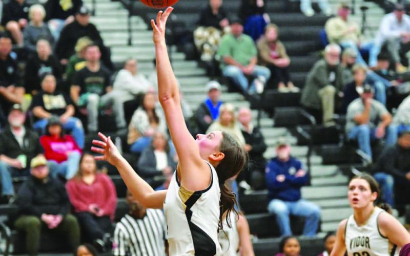 Allie Williams finds an open lane to the basket for her shot.