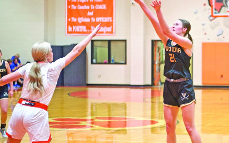 Sinking a three Senior guard Madison Powell sinks a three-pointer in the Lady Pirates win in Orangefield.