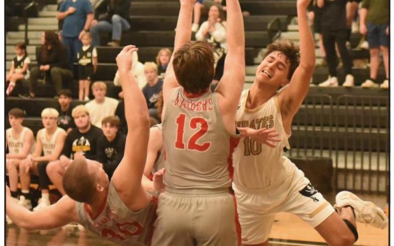 Prate senior Aiden Ochoa tries to get off a shot in Vidor’s triple OT loss to Lumberton. Photo by Randall Luker