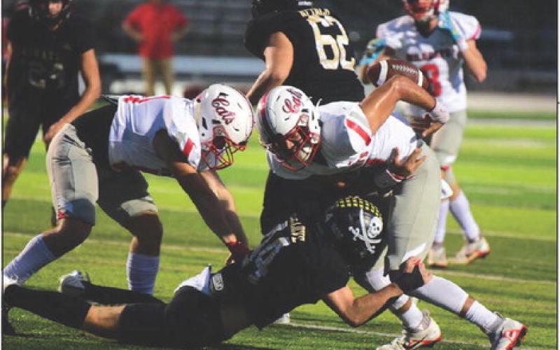Tate Ardis caused this fumble to end an early Wildcat scoring threat inside the Pirate five yard line.