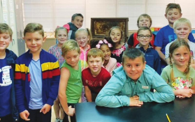 Local beekeeper pays a visit to Pine Forest Elementary