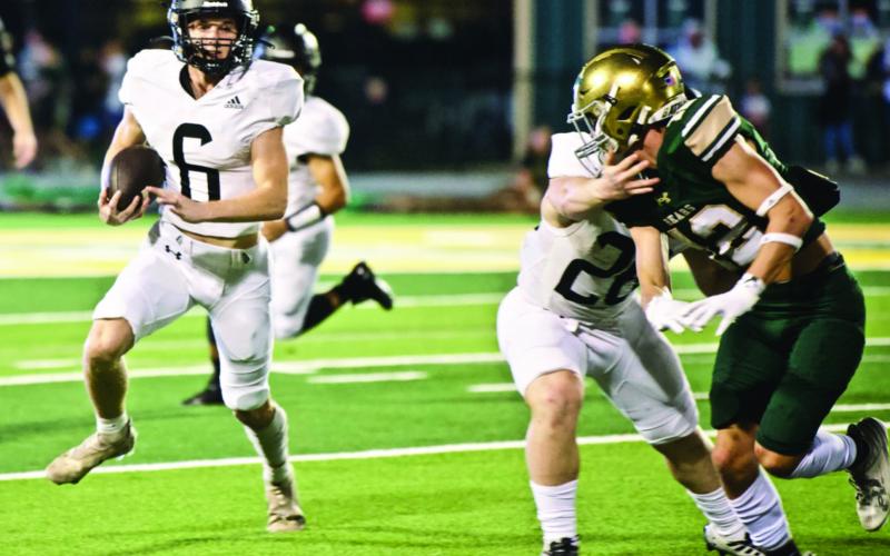 Pirate RB Riley Marlow, #26, takes on a blocking role for fellow RB Dane Villadsen, #6.