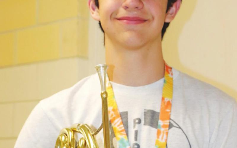 Mosiah Keffer received a medal for his French horn solo.