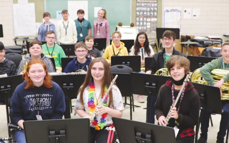 Members of the VJHS symphonic band receiving medals for their solos gathered for one photo.