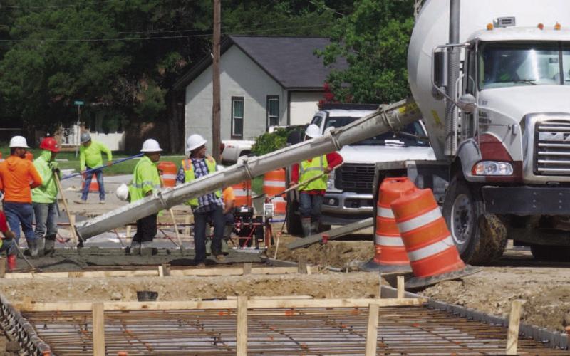 Workers dodge showers and downpours as work on Orange Street and drainage projects continue near Vidor High School. Vidor ISD said he had not received a recent estimate for completion of the project but he was hoping street work near the high school by the time school starts for the 2025-2026 school year.
