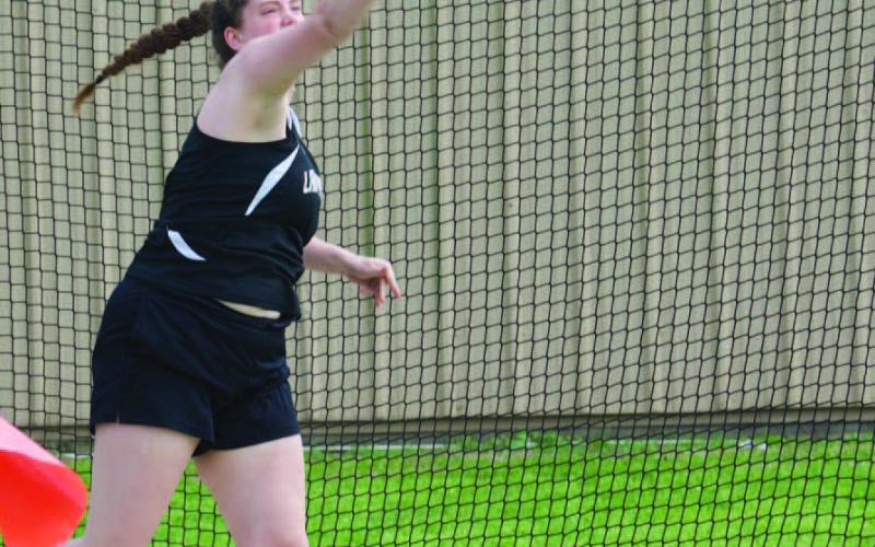 Lady Pirate Rylee Sherman placed third in discus with a 93’ 5” throw at the BC Relays held last week. Photo by Randall Luker