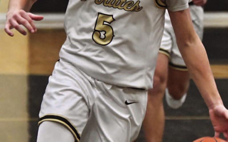 Eric Baker, #1, scored 15 points in Vidor’s win at Bridge City Friday.