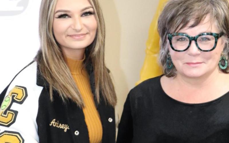 VHS Junior Andreya Garrett honored Ms. Kimberly Crossley with a book to be place in the Vidor High School library.