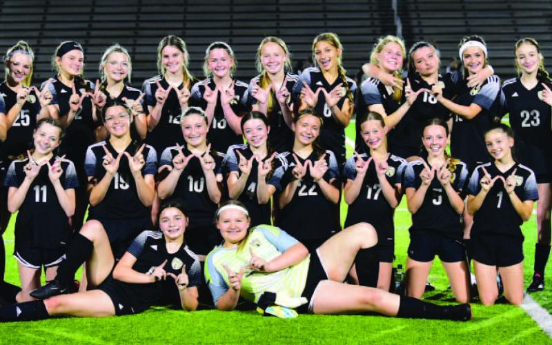 The 8th grade Vidor Lady Pirate soccer team won their first game 4-0 Thursday at Pirate Stadium. Vidor hosted Central Middle School. The game was the first for the new junior high program now in its first year. Photo by Randall Luker