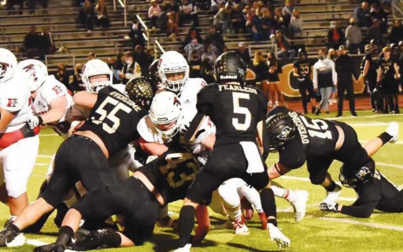 The Pirate defense came through time and again Friday with plays like this 4th and 1 stop on the six-yard line. Identifiable Pirates include #26 Layne Wilhelm. #55 Jordan Smith, #43 Colby Smith, #5 Dylan Dial and #15 Tristen McGowan.