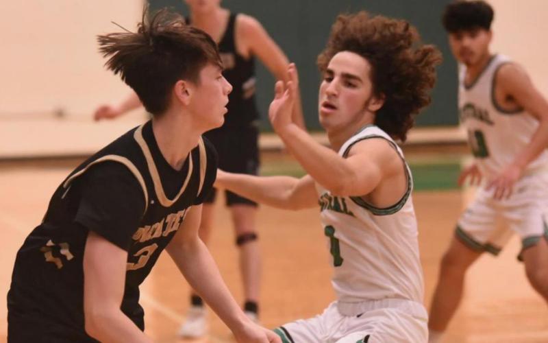 Senior Colby Eaves breaks around a Central defender in Thursday’s late game at the LCM Tournament. Photo by Randall Luker