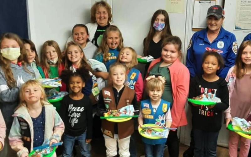 Girl Scouts donate pet supplies