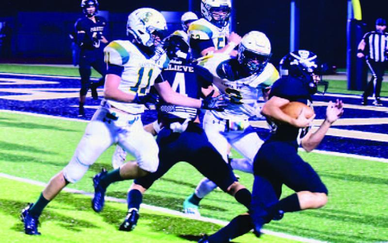 Daigan Venable runs to the end zone for a TD with blocking by Ricky Gall. Photo by Randall Luker