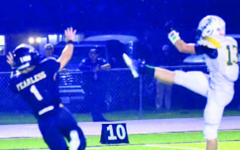 Westin Baker came close to blocking this punt Friday. Photo by Randall Luker
