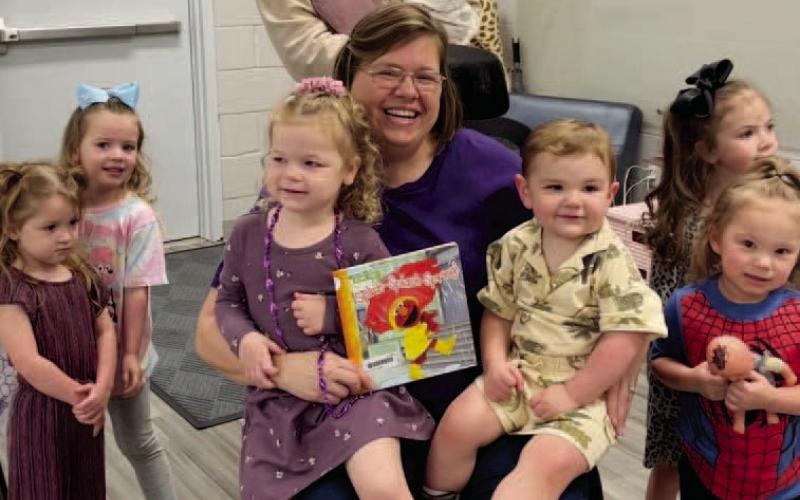 Itty Bitty Storytime was held on Tuesday, March 4, 2025. Library clerk Sarah Screws read “Splish-Splash Spring!” by Liza Alexander. “Spring showers bring flowers and fun to Sesame Street in this rhyming storybook! Elmo and friends say, “So long, winter!” by splashing in puddles and dancing in the rain.”The children made I spy sensory bottles with rice and trinkets.