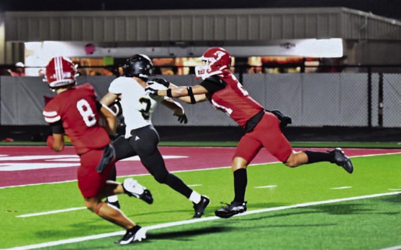 Daigan Venable eludes the grasp of a Bridge City defender as he scores on a 16-yard touchdown run.