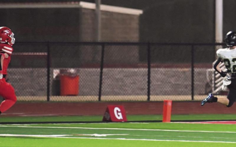 Marcus Harris poured on the speed to outrun his pursuers on his 61-yard touchdown run Friday in Bridge City.