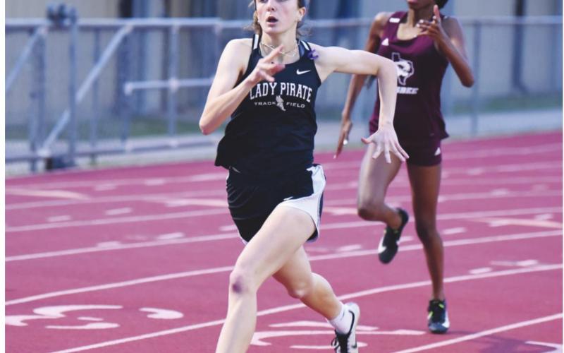 Lady Pirate Amelia Wright stretches out in the 400 meter run. Wright won the event with a time of 1:03.1. The VHS junior also won the 800M and ran a leg of the Lady Pirates’ winning 1600M relay team.