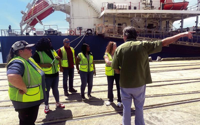 Teacher Externs Brandy Whisenant, of Vidor High School; Nadria Turner, of Lincoln Middle School; Michael Blakeney, of Bridge City High School; Alecia Jackson, of Beaumont United High School and Jamie Morgan of Monsignor Kelly Catholic High School take a tour of the Port of Port Arthur by Ronnie Hicks, Director of Operations for the port. Courtesy Photo Port of Port Arthur