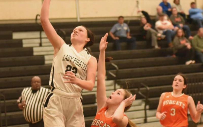 Freshman Lady Pirate Madison Perkins shoots a layup versus the Orangefield Lady Bobcats Tuesday.