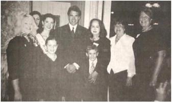 Pictured with Texas Governor Rick Perry at roast of retiring State Representative Ron Lewis are, from left, Chrystal Reeves, Lena Rambo, Miss Texas USA Nicole O'Brian, Brandi Motte, CASA Executive Director Jane Stevenson, Corby Stevenson, Ellen Hay and Sharon McMullen.