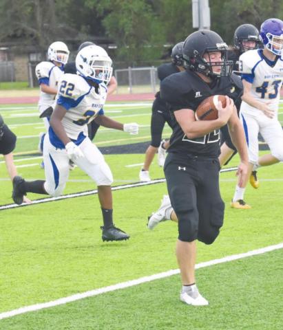 Pirate JV running back Caleb Dean finds plenty of running room as he rounds the corner over the right side against the Bay City Blackcats Thursday, Photo by Randall Luker
