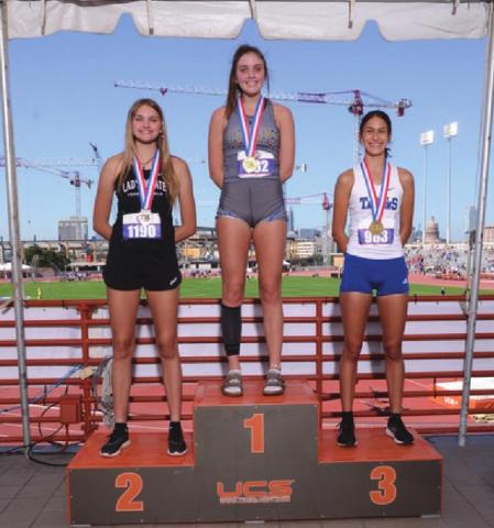 Vidor Lady Pirate Freshman Raegan Stephenson was awarded a silver medal in 4A competition at the State Track Meet Thursday in Austin for her leap of 5’4”. Also pictured are Brenna Bottoms, senior, Nevada Community School, who took first place with 5’5’ and third place medalist Madison Ramos, junior, Port Isabel, 5’4” Photo courtesy of Jeffrey Bishop