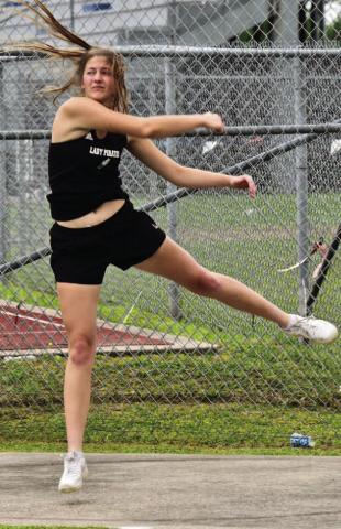 Lady Pirate Madison Powell won the district championship in the girls discus event Monday at West Orange. Photo by Randall Luker