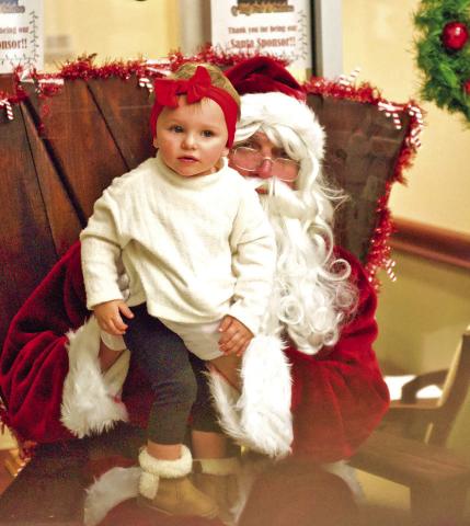 Special Time With Santa Santa Claus greeted and listened patiently as children enjoyed their special time during the Light Up City Hall event Friday during Vidor Hometown Holidays celebration.