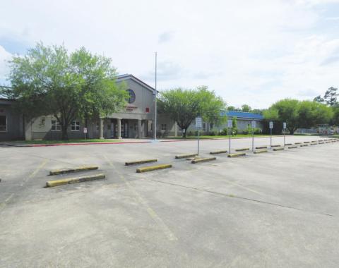Photo by George Garza The empty parking lot on a school afternoon is evidence that student have been released from school in light of approaching tropical disturbances. The Superintendent of School says families should be together during these uncertain times.