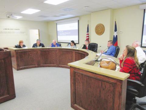 This Vidorian archive photo of the Vidor I.S.D. School Board of Trustees shows the current board during a pre-COVID-19 School Board meeting. Board members from left to right are; Trustee Gina VanDevender, Trustee Mike Helms, Trustee Mike Marion, Trustee Carrie Vincent, Superintendent of Schools Dr. Jay Killgo, Trustee David Camp, Trustee Rollie Burr, and Trustee Natalie Long.