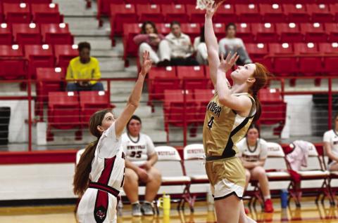 Ashlynn Martin takes a shot during Friday’s win over the Deweyville Lady Pirates.